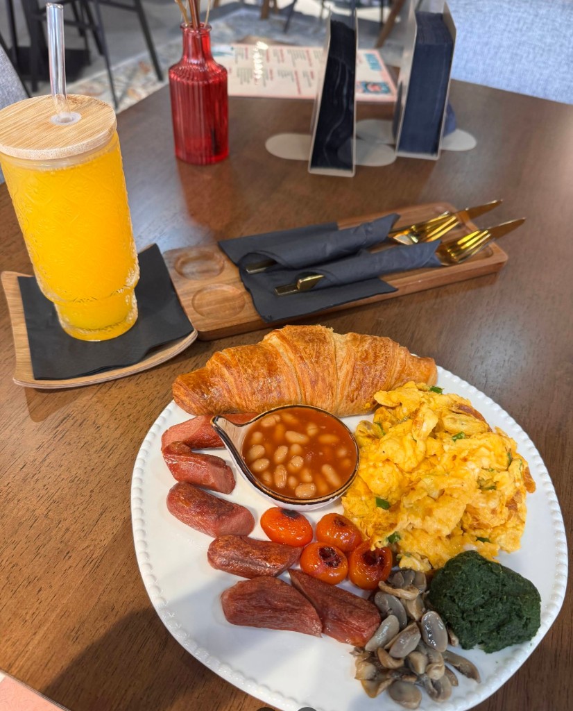 Full English breakfast with orange juice