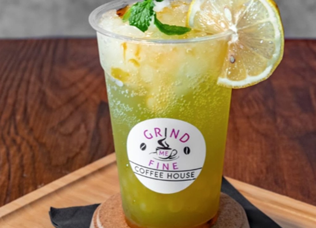 Signature mint lemonade in Grind Me Fine branded cup