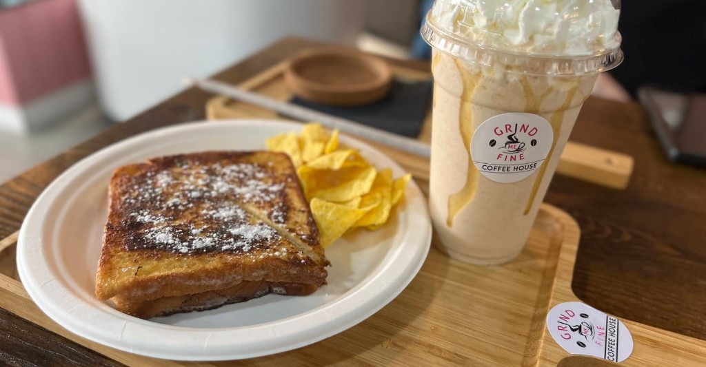 Latte and avocado toast combo on wooden tray